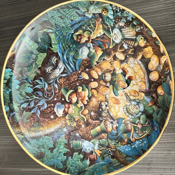 12 holiday Bill Bell cat plates and wall hangings